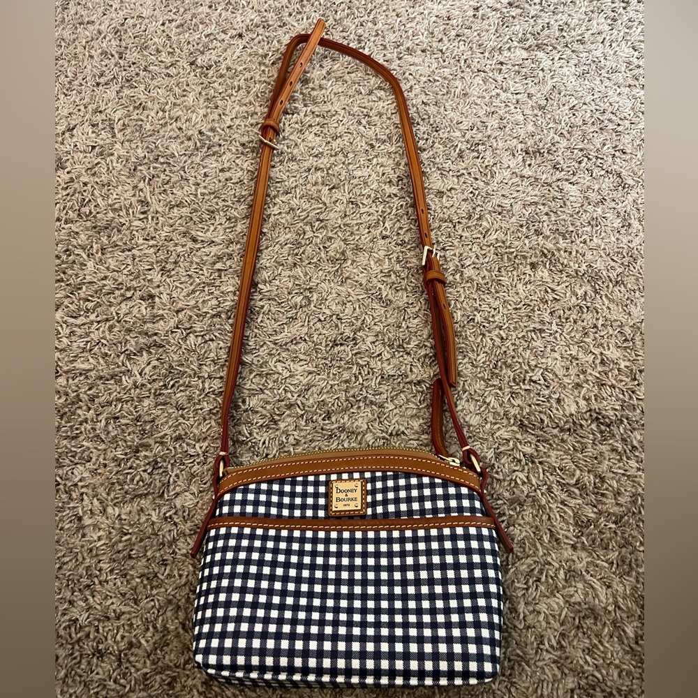 Never used, Dooney and Bourke crossbody bag.
